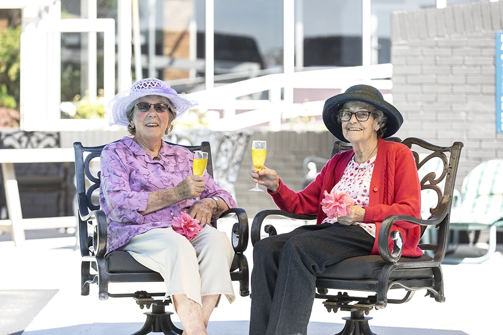 eldery-friends-drinking-pool-side-v2
