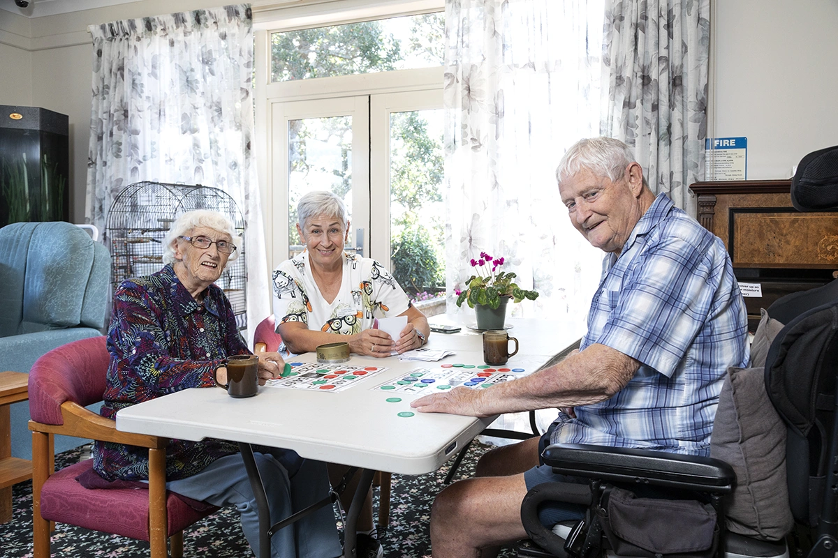 group-of-elderly-people-playing-board-games